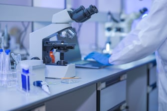 microscope-and-laptop-in-a-modern-scientific-resea-2026-09-07-15-25-22-utc-1